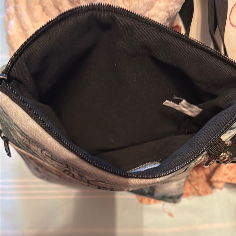 Cutest ever Parisian crossbody bag.  It’s soft and only used once.